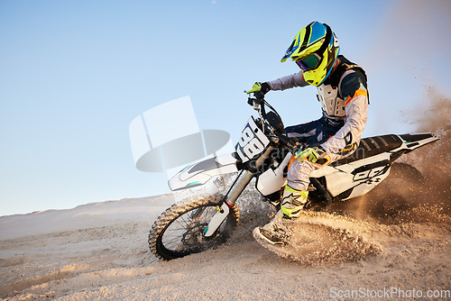 Image of Desert, moto cross or sports adventure athlete in sand for exercise, workout or speed. Travel, dirt and bike with energy of man in Dubai race on dirt with challenge and sport fitness with freedom