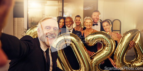 Image of Selfie, new year and celebration with a business man and team taking a picture at an office party. Portrait, photograph and event with a mature male employee and colleague group celebrating at work