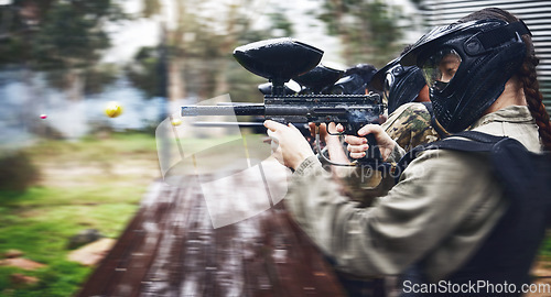 Image of Paintball, soldier and action with gun for shooting, speed and military battlefield with sports, war and fitness outdoor. People together in camouflage, mask with weapon and game, power and lifestyle