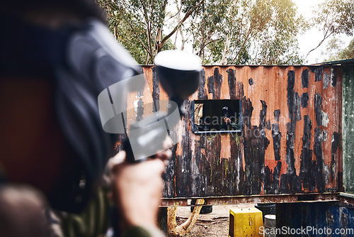 Image of Paintball game, paint gun and men in war, competition or sports challenge outdoor for target shooting. Military, soldier or army men doing teawork training mission in woods with people or friends