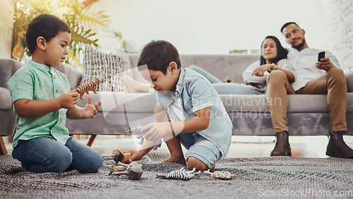 Image of Dinosaurs, family or children play with toys for development growth with mother and father relaxing watching tv. Education, siblings or young boys playing fun toys or games for kids at home together