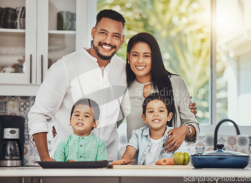 Image of Cooking, happy and portrait of family in kitchen for food, learning and support. Help, nutrition and health with parents teaching children with salad for lunch for wellness, bonding and vegetables