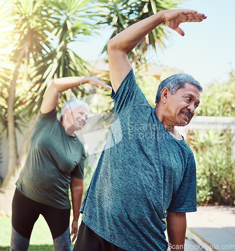 Image of Fitness, yoga and health with a senior couple outdoor in their garden for a workout during retirement. Exercise, pilates and lifestyle with a mature man and woman training together in their backyard