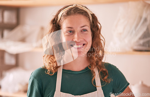 Image of Face, thinking and startup with a woman entrepreneur working in her small business pottery workshop. Idea, studio and creative with a happy female designer at work as a ceramic artisan or potter