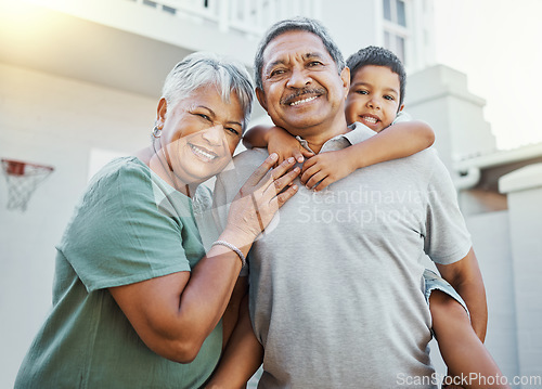 Image of Piggyback, love and portrait of grandparents with a child in the backyard of their family home. Happiness, smile and elderly man and woman in retirement bonding with grandson outdoor their house.