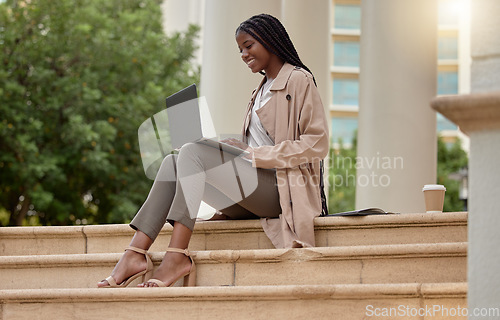 Image of Steps, city and black woman typing on laptop in street, social media or internet browsing. Technology, computer or happy remote worker or business female working on research, email or project in town