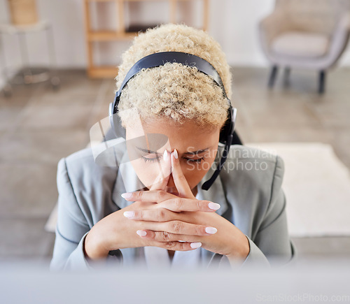 Image of Black woman, stress headache and telemarketing in call center office for crm contact us and customer support helpline. African girl, frustrated and overworked networking consultant upset in agency
