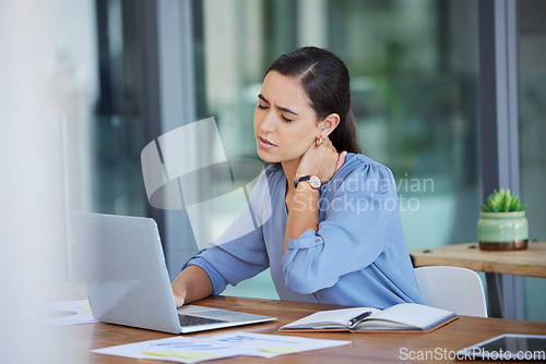 Image of Stress, neck pain and business woman on laptop at office desk with joint injury risk. Tired worker, burnout and body fatigue while working on computer with anxiety, muscle problem or poor posture
