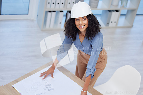 Image of Architect, woman portrait and blueprint of engineer drawing plan on paper for building development. Happy contractor at office desk for project management, architecture and engineering mockup space