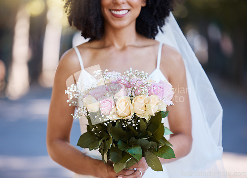 Image of Happy, wedding and smile with bride and flowers for beauty, celebration and spring event. Happiness, makeup and fashion with black woman and rose bouquet for marriage, party and outdoor ceremony