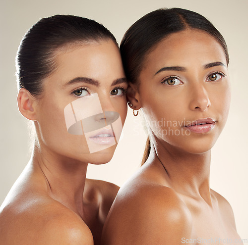 Image of Portrait, women and friends with skincare, cosmetics and dermatology on studio background. Face detox, female and ladies with makeup, grooming routine and luxury for smooth, soft skin and diversity