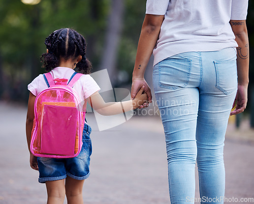 Image of Holding hands, mom and child walking to school, help and care with support outdoor, education and growth. Kindergarten, development in childhood and backpack, family, woman with girl in the morning