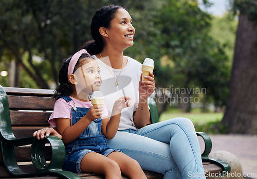 Image of Summer, park and ice cream with a woman and girl bonding together while sitting on a bench outdoor in nature. Black family, children and garden with a mother and daughter enjoying a sweet snack