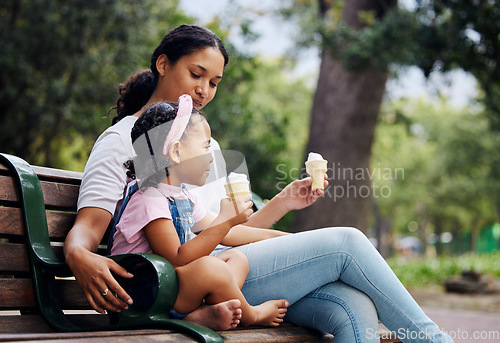 Image of Summer, garden and ice cream with a mother and daughter bonding together while sitting on a bench outdoor in nature. Black family, children and park with a woman and girl enjoying a sweet snack