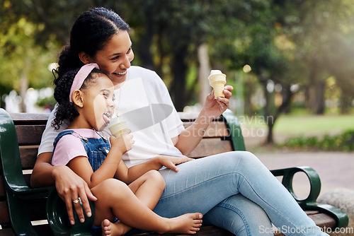 Image of Summer, park and ice cream with a mother and girl bonding together while sitting on a bench outdoor in nature. Black family, children and garden with a woman and daughter enjoying a sweet snack