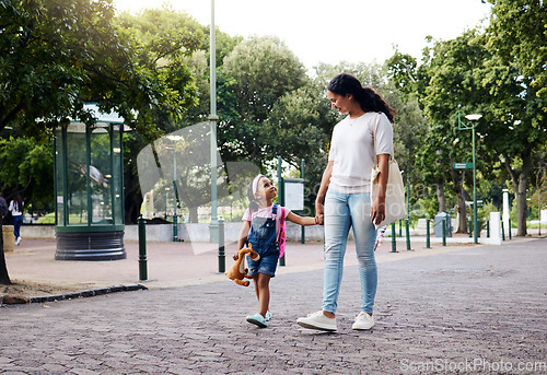 Image of Park, walking and mom holding hands with girl enjoy weekend, summer holiday and adventure outdoors. Love, black family and mother with child in morning for back to school, kindergarten and education