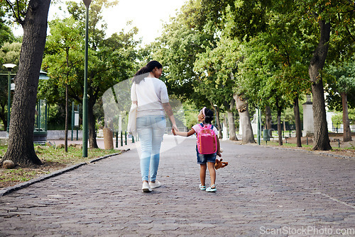 Image of Walking, park and mother holding hands with girl on journey for back to school, learning and class for first day. Love, black family and mom with child walk for kindergarten, education and play date