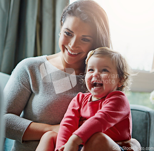 Image of Relax, happy and laughing with mother and baby on sofa for bonding, quality time and child development. Growth, support and funny with mom and daughter in family home for health, connection and care