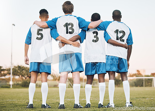 Image of Soccer, team and hug standing with back on the field in partnership, trust or ready for sports game or match. Sport men hugging in teamwork, collaboration or unity for fitness, training or workout