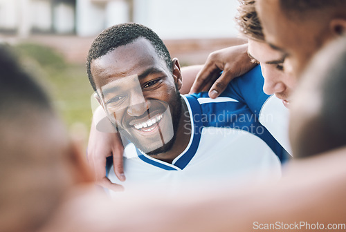 Image of Black man, soccer team and football athlete outdoor in group hug before sports game on field. Sport training, teamwork and excited African player happy about fitness exercise and workout with people