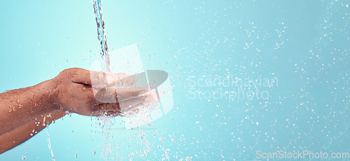 Image of Water stream, splash and black hands with mockup for cleaning and morning hand cleaning. Blue background, mock up and person with skincare, sustainable dermatology and clean health safety in studio