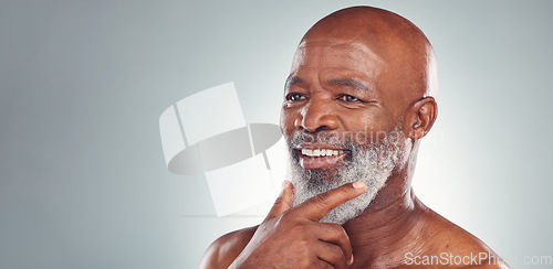 Image of Senior black man, smile and beard in skincare for facial treatment, cosmetics or thinking on mockup. Happy elderly African American male smiling face in satisfaction against a grey studio background