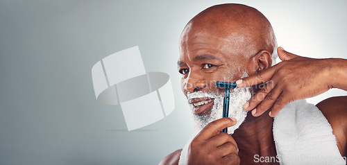 Image of Black man, beard and shaving face in skincare for grooming, self care or facial treatment on mockup. African American male smiling for clean hygiene, shave and cream with razor on a gray background