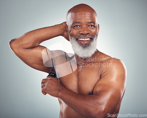 Image of Portrait of black man with roll on deodorant, smile and body care grooming isolated on grey background. Skincare, health and happy senior male, armpit skin product for cleaning and wellness in studio