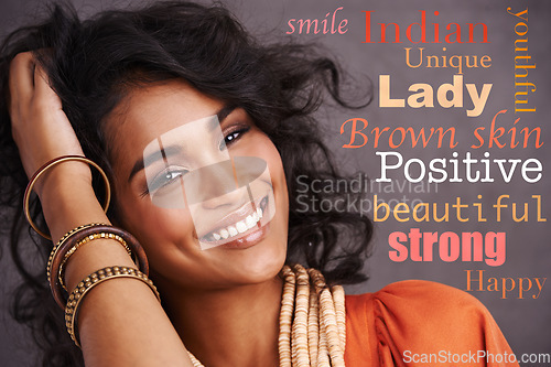 Image of Beautiful, confident and portrait of a woman with words of affirmation isolated on a studio background. Happy, smile and face of an Indian model with an overlay message, empowerment and backdrop text