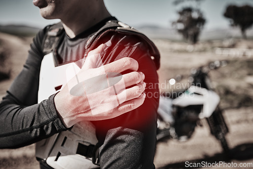 Image of Closeup, biker outdoor and shoulder pain with muscle tension, strain and inflammation while competing. Male rider, man and male athlete with stiffness, torn and accident emergency with inflamed joint