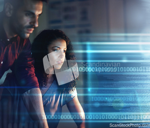 Image of Woman, businessman and computer in night for overlay, futuristic hologram or teamwork for coding strategy. Team, dark office and with holographic tech abstract for focus, pc or information technology