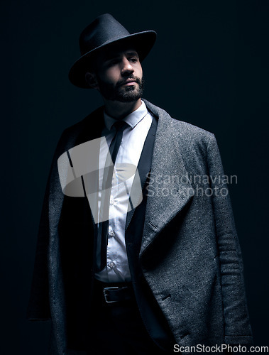 Image of Fashion, suit and classy man thinking of clothes isolated on a dark background in a studio. Mafia, idea and corporate model with fashionable, elegant and professional clothing for work on a backdrop