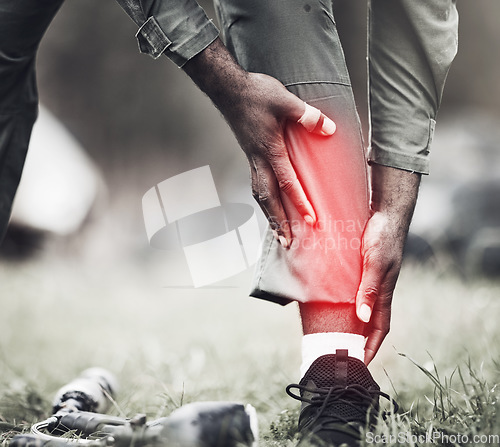 Image of Leg injury, military fitness and black man soldier on a field with joint pain from exercise drill. Sports run, medical emergency and military performance accident in war with blurred background