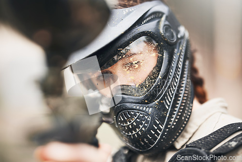 Image of Paintball, gun focus and soldier in training on a mission ready for military shooting exercise. War competition game, military man and battlefield action fight outdoor with sniper vision and workout