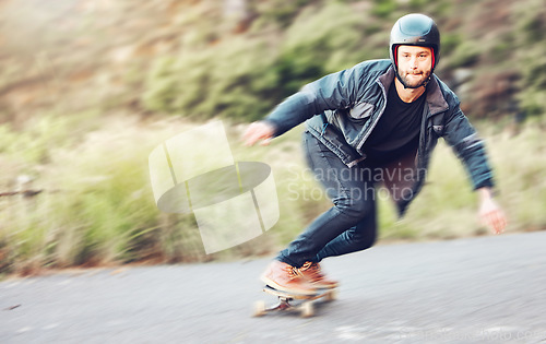 Image of Sports, skateboard and man skating on road for fitness, exercise or wellness. Training, freedom and portrait of male skater moving with fast speed, skateboarding or riding outdoors for action workout