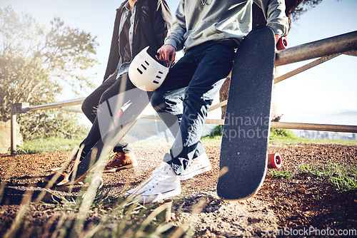 Image of Skateboard, sports and legs of friends in park ready for adventure, freedom and enjoying hobby together. Friendship, fitness and skater men with longboard for exercise, skating and training outdoors