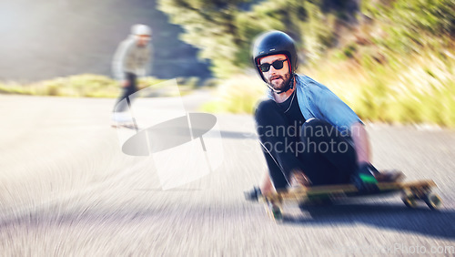 Image of Sports road, skateboard and man skating for fitness, exercise and wellness. Training, sunglasses portrait and male skater sitting on board moving with fast speed, skateboarding and riding for action.