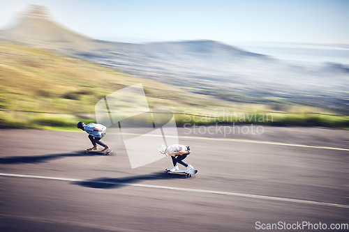 Image of Skateboard, fast and road with people training, competition or danger, risk and adventure sports from above. Speed, motion and moving skater team on a street for youth energy, performance and action