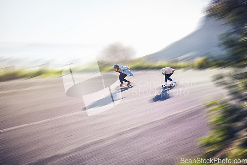 Image of Skateboard, fast and people on road training, competition or danger, risk and adventure sports, above. Speed, blurred background and skater team moving on street for youth energy, balance and action