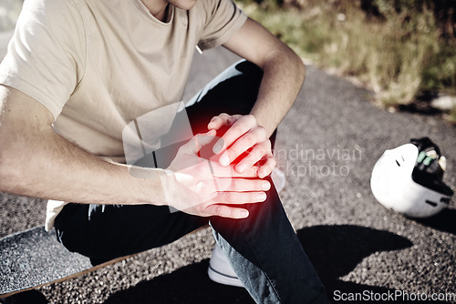 Image of Hands of man, knee pain and skateboarder with injury after fall, accident or workout outdoors. Sports, fitness and male skater with fibromyalgia, arthritis or leg inflammation after skating exercise.