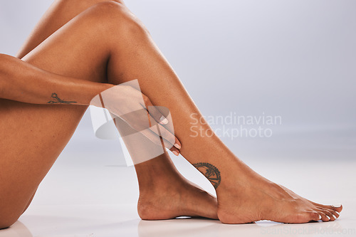 Image of Legs, feet and skin, woman and beauty, skincare epilation and pedicure isolated on studio background. Health, wellness and grooming, waxing or laser hair removal, dermatology and cosmetic care