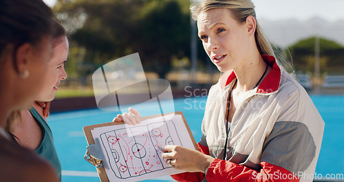 Image of Planning, sports and coach with a strategy for hockey, team training and education on a game. Learning, coaching and woman teaching an idea for a sport competition on paper to girls on a court