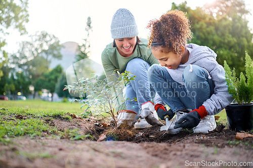 Image of Volunteer, child and woman with plant for gardening in park with trees in nature environment. Happy family team helping and planting for growth, ecology and sustainability for community on Earth day