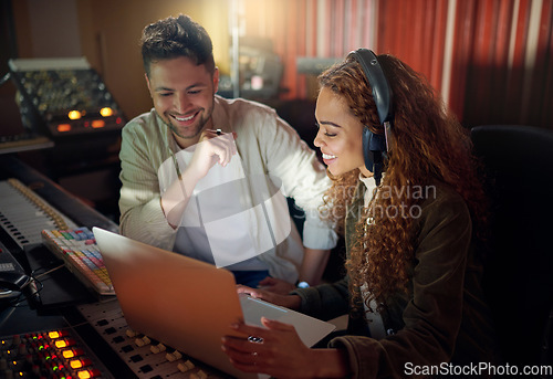 Image of Collaboration, teamwork or music recording with sound engineering headphones, laptop or computer in edm studio. Musician, friends or happy people on technology in radio, audio or dj media production