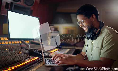 Image of Black man, happy or laptop for music recording, sound engineering or song composition in studio. Producer, DJ or smile musician on technology with ideas for live streaming radio, audio or media album