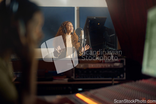 Image of Musician, singing or studio recording microphone in album, audio or radio music cover in night production. Singer, artist or woman in evening song, media or sound performance practice for pop track