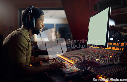 Image of Happy, musician or technology mockup screen in music recording, sound mixing or studio song composition. Producer, happy or black man with computer headphones for dj radio, audio mock up or media app