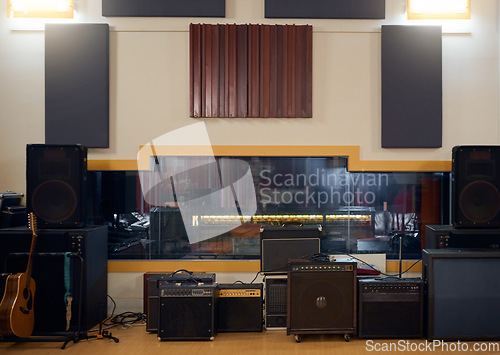 Image of Recording studio, music and musical equipment for broadcast, radio or entertainment industry. Media, instruments and technology for a album or song production and sound track performance in a studio.