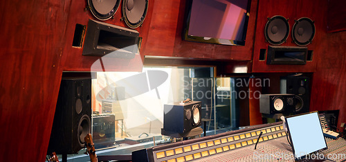 Image of Music, studio and production with recording equipment in an empty room for the entertainment industry. Interior, creative and audio with musical electronics to produce, record or control sound