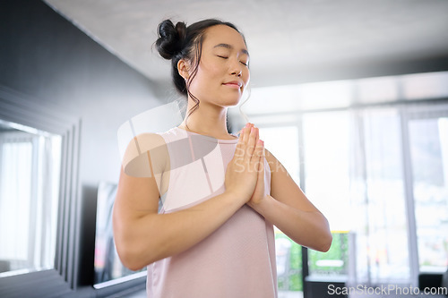 Image of Yoga, meditate and woman with gratitude for her mind, peace and calm start to the morning. Hope, freedom and Asian girl in the living room for a mindset exercise, spiritual faith and mindfulness